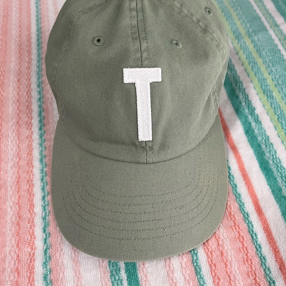 Rey to Z green hat Letter T